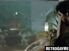 Ripped man cums while being watched in retro clip