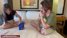 Dark-haired slut rides schlong after strip game loss