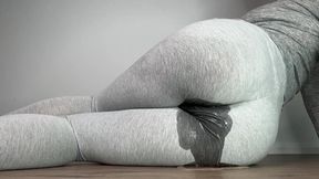 Desperate girl pees her leggings all day