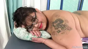 Big-titted Asian BBW gets massaged and toyed