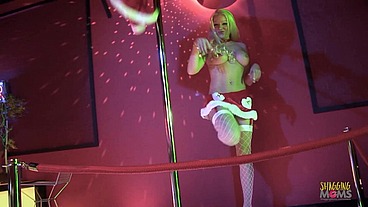 Strip club celebrates by having Christmas themed anal group sex with the blonde and brunette milfs