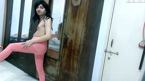 Cute sissy crossdresser femboy Sweet Lollipop tying out a pink pantyhose.