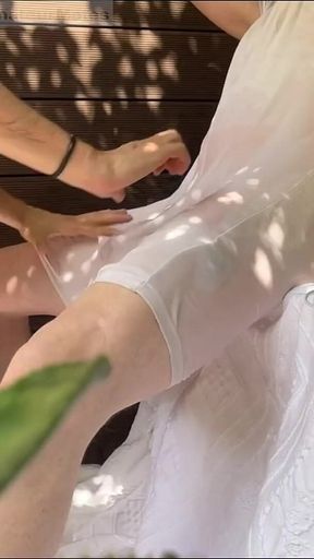 A Boy Has Fun Watering His Friend's White T-shirt and Exposing His Smooth Ass and Big Cut Cock