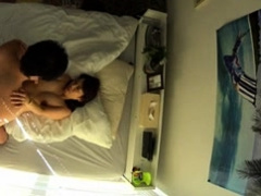 Stacked Japanese milf gets pumped full of cock on the bed