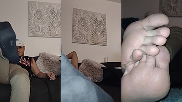 He shows his feet and stockings