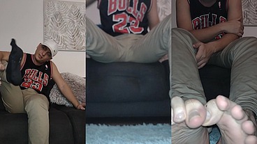 He shows his feet and stockings
