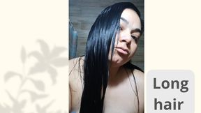 I put cream on my face and comb my long hair