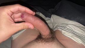 Shaved uncensored teen jerks off massive uncut dick solo until thick load drips down balls