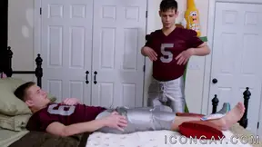 Amazing young gay takes care of his rivals injury and cock