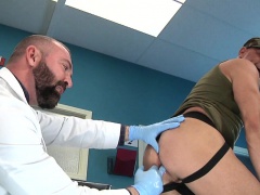 Doctor examines his ass and sticks his fingers and then his fist in