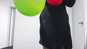 Women Popping Balloon with Pins