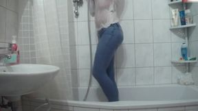 Wetlook pissing and showering jeans