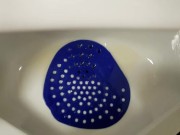 Public urinal piss