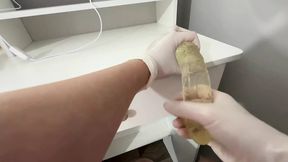 I give a handjob to the dildo with oily hands in medical white gloves