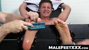 Restrained hunk enjoys toe worship by a man