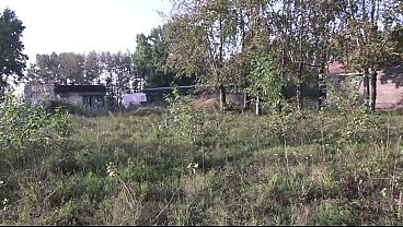 BBW pees outdoors, giving a powerful stream of urine from her hairy cunt.