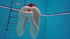Pretty Polish teen Alice swimming without clothes