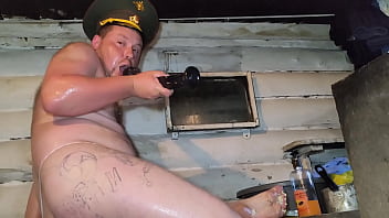 A Russian guy with a huge ass and an army cap fucks anal