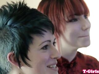 Inked transgirl straponfucked by redhead hottie
