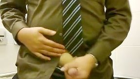 wank and cum in officewear at Singapore washroom