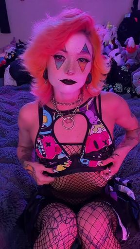 Clown-themed fun with big tits