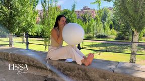 Inflating and Popping Them with Bare Feet Outdoors