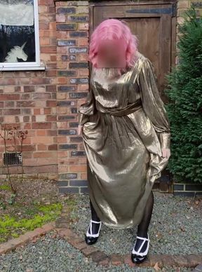 Hot crossdresser in gold metallic dress