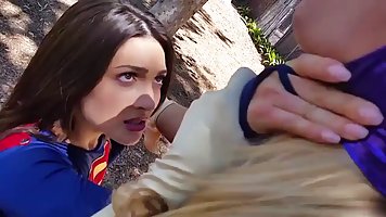 Batgirl and Supergirl have turned into enemies and they are trying to hurt each other