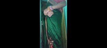 Indian gay Crossdresser Gaurisissy in Green Saree pressing her big Boobs and fingering in her ass