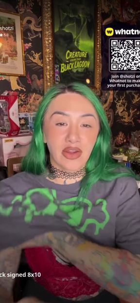 Green hair, black shirt