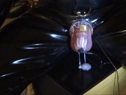 Estim cum milking with chastity device