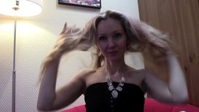 foxy blonde milf shows off stockings in sfw webcam clip