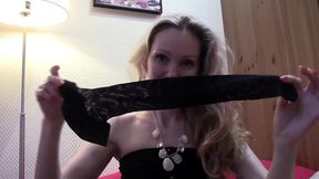 foxy blonde milf shows off stockings in sfw webcam clip