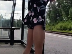 HannaTransa Chastity Crossdresser outdoors at train station.