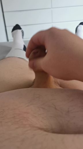 Fat man masturbates in white knee socks