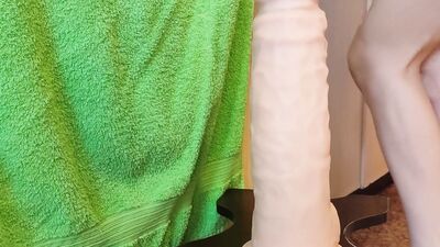 Petite MILF gets impaled on a giant monster dildo