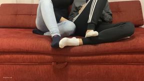 TWO GIRLS PLAYING SEXY FOOTSIE IN SOCKS BIG AND SMALL FEET - MP4 MOB