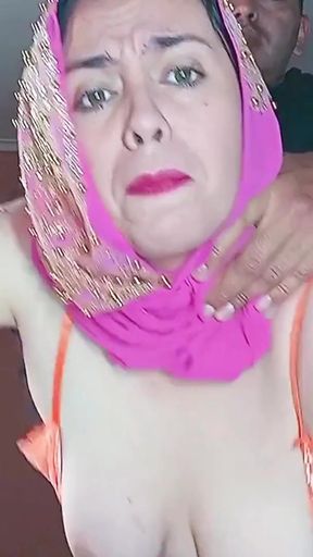 The Indian woman wearing a hijab allows herself to be dominated in the kitchen.   Clip 1