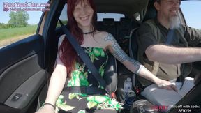 Girl putting on remote controlled vibrator and stimulated on drive to public park