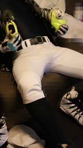 A baseball player with a nip morro sensing socks wanks with XXL football spikes