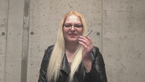 Enjoy a cig with leather step-mommy POV