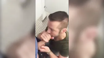 Handsome hunk gives amateur blowjob in restroom stall