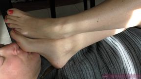 Foot and boot worship under table