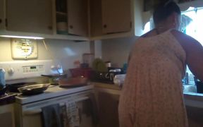 Stepmom stirs spicy thigh chicken drip while flashing thong and gigantic tits in the kitchen