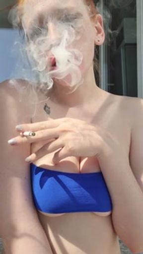 smoking redhead with ruined makeup