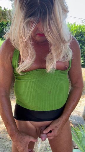 Transgender Kassy54 drinks piss outdoors