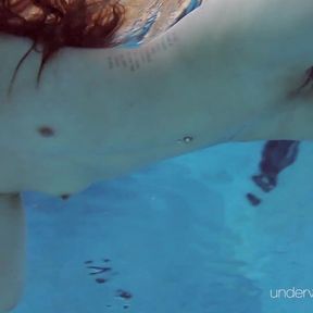 Roxalana Cheh sexy redhead underwater