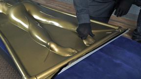 Bastinado and tickle in a gold latex bed