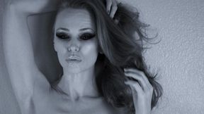 Noir BTS of Autumn Orchid posing and flirting with the camera while doing test shots