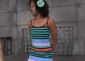 Humble slim ebony chick with curly hair is tied up and sucks stiff prick